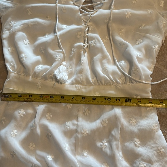 WHITE FLORAL ROMPER WITH BELL SLEEVES - Picture 13 of 14